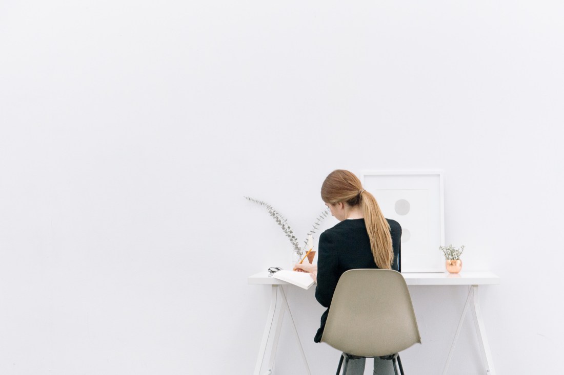 woman designing at desk